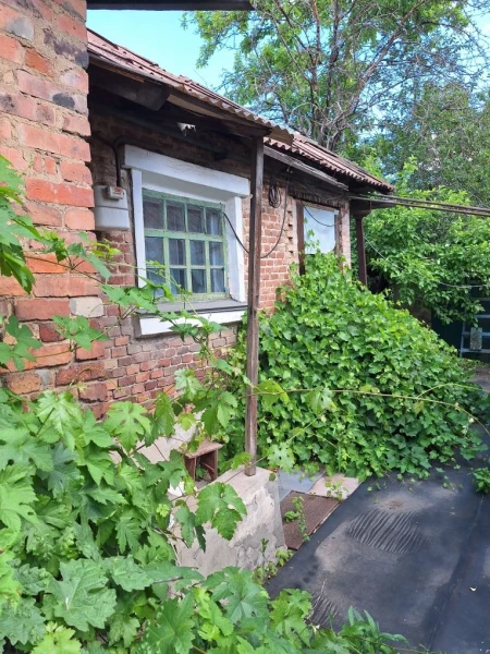 Фото Продаётся 4-комнатный дом в городе Стаханов (центр города), ул. Тельмана.