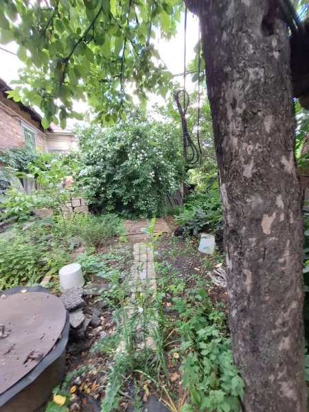 Фото Продаётся 4-комнатный дом в городе Стаханов (центр города), ул. Тельмана.