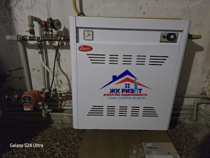 Фото Дом на улице Коммунарской