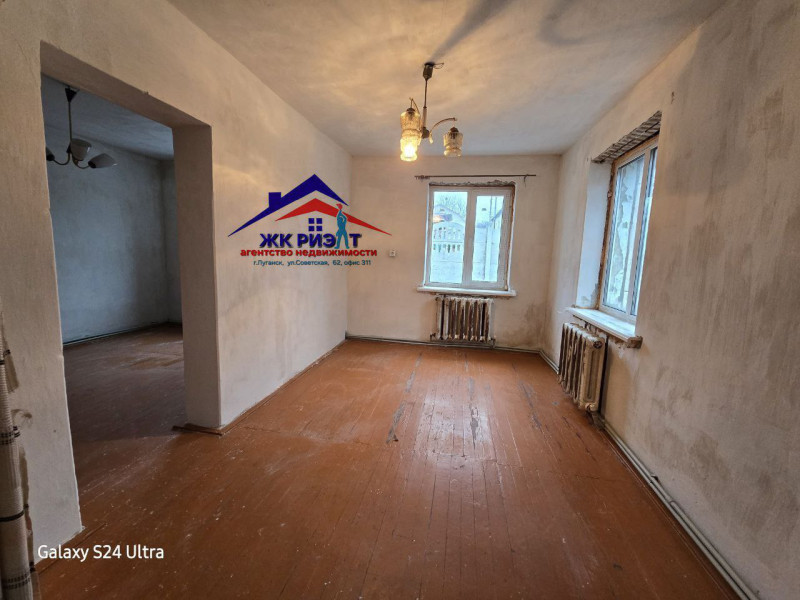 Фото Дом на улице Коммунарской