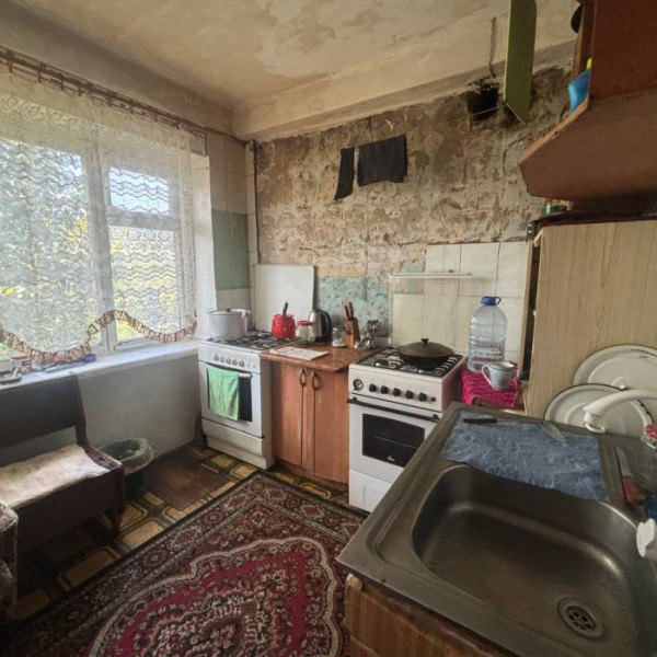 Фото Продам 2 комнаты в коммунальной квартире на кв. Ватутина, 5/5 эт