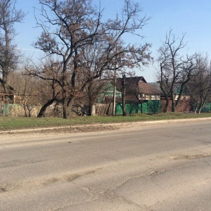 Продам земельный, вдоль дороги по ул Мадридская