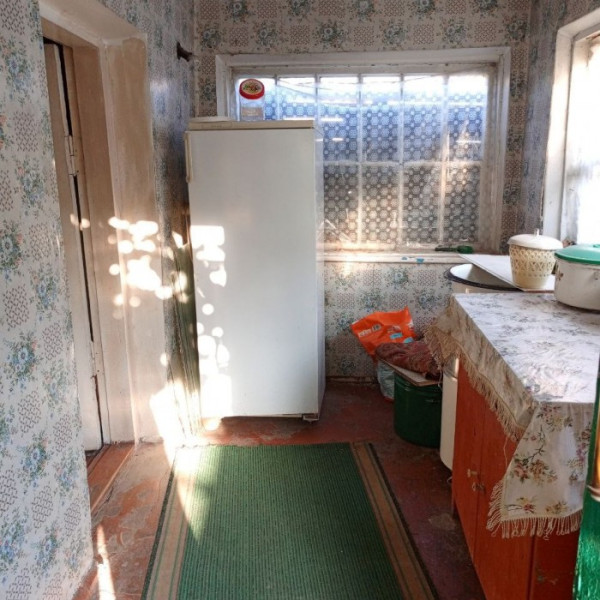Фото Продам часть дома и флигель общей площадью 58 кв. м. на одном участке (с отдельным входом), в г. Луганск ул. Мощинский Яр (р- н кв. Гер. Стал.)