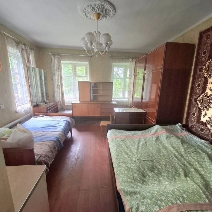 Продам дом и флигель 2-й аэродромный проезд (р-н чёрного кота) г. Луганск.