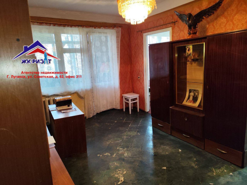 Фото Четырехкомнатная квартира на 50-лет Октября