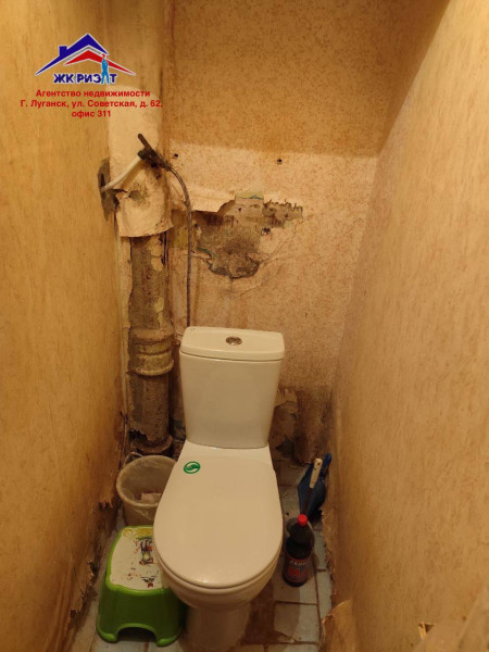 Фото Четырехкомнатная квартира на 50-лет Октября