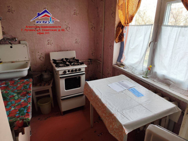 Фото Четырехкомнатная квартира на 50-лет Октября