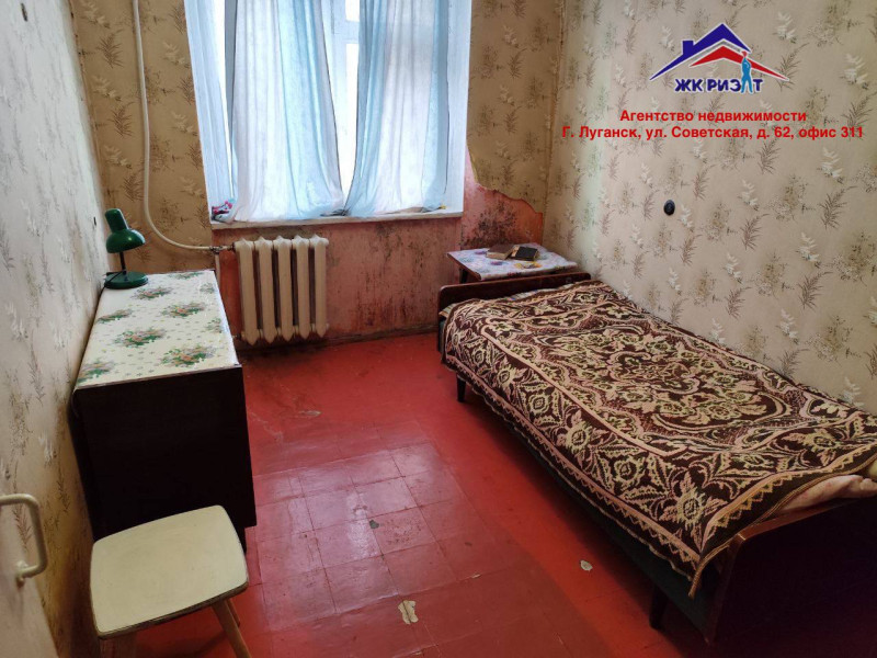 Фото Четырехкомнатная квартира на 50-лет Октября