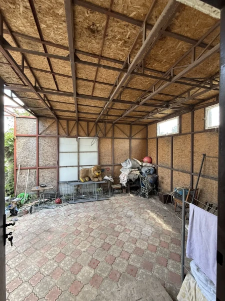 Фото Продаётся 4-комнатный дом + коммерческое помещение в городе Стаханов, ул. Мичурина (центральная часть города)